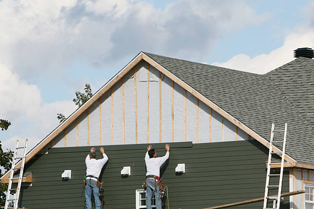 Professional Siding Contractor technician working in Bridgeport, NY